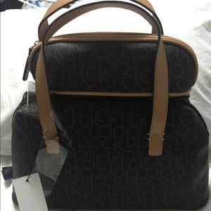 Calvin Klein hand bag with small cosmetic bag